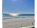 Ocean and beach view from a condo at 1000 N Waccamaw Dr. # 302, Murrells Inlet, SC 29576