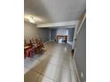 Dining area with tile floors and a wooden table with chairs at 1025 Carolina Rd. # B-4, Conway, SC 29526