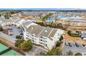 A high-angle view of the condo building, showing the layout of the surrounding community at 1100 Possum Trot Rd. # E-238, North Myrtle Beach, SC 29582