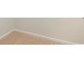 Beige carpeting in a corner of a room with white baseboards at 181 Ashworth Dr., Tabor City, NC 28463