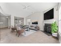 Spacious living room with fireplace and staged furniture at 2209 Beauclair Ct., Myrtle Beach, SC 29579