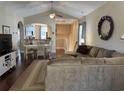 Open living room and dining area with hardwood flooring at 408 S 7Th Ave. S, North Myrtle Beach, SC 29582