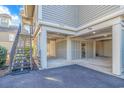 Open carport space with decorative lattice walls, offering ample parking and access to the home's entrance at 1609 Harbor Dr., North Myrtle Beach, SC 29582