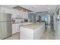 Modern kitchen with granite countertops and stainless steel appliances at 161 Seawatch Dr. # 1017, Myrtle Beach, SC 29572