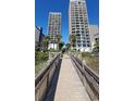 Wooden boardwalk leading to oceanfront building at 2406 N Ocean Blvd. # Ph4-1704, Myrtle Beach, SC 29577