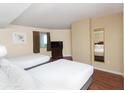 Bedroom featuring two beds, a window with curtains, a dresser with a TV, and a mirror on the wall at 2504 N Ocean Blvd. # 832, Myrtle Beach, SC 29577