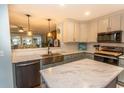 Modern kitchen with stainless steel appliances and white cabinets at 3040 Thoroughfare Dr., Conway, SC 29526