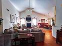 Vaulted ceiling living room with fireplace and hardwood floors at 3169 Shorecrest Bay Dr., Murrells Inlet, SC 29576