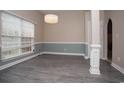 Simple dining room with light walls and gray flooring at 3562 Battery Way Ct., Myrtle Beach, SC 29579