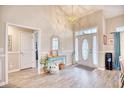 Bright and airy entryway with an elegant front door, hardwood floors, and tasteful decor at 520 Hobie Cat Rd., Myrtle Beach, SC 29588