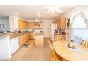 Bright kitchen with an island and light wood cabinets at 567 Woodholme Dr., Conway, SC 29526