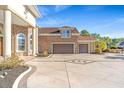 Three-car garage with decorative concrete driveway at 8010 Wacobee Dr., Myrtle Beach, SC 29579