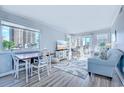 Bright living room with ocean view, featuring light-colored furniture at 9571 Shore Dr. # 119, Myrtle Beach, SC 29572