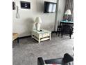 Living room with coffee table and neutral carpeting at 161 Seawatch Dr. # 1108, Myrtle Beach, SC 29572