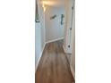 Gray walls and wood-look flooring in the hallway at 2504 N Ocean Blvd. # 1633, Myrtle Beach, SC 29577