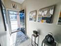 Bright entryway with tile flooring, and artwork at 270 Connemara Dr. # C, Myrtle Beach, SC 29579