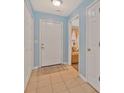 Light and airy entry with tiled floors and closets at 4850 Meadowsweet Dr. # 1711, Myrtle Beach, SC 29579