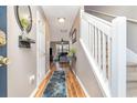 Bright entryway with hardwood floors, leading to living room and stairs at 629 Riverward Dr. # 629, Myrtle Beach, SC 29588