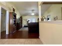 Living room with hardwood floors, fireplace, and access to backyard at 635 Bucks Trail, Longs, SC 29568