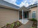 Side view showing a rocking chair on the porch at 663 Pinehurst Dr. # 93C, Pawleys Island, SC 29585