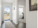 Bright entryway with view into home office and hardwood floors at 9179 Fort Hill Way, Myrtle Beach, SC 29579