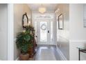 Bright entryway with decorative mirror and plant at 1055 University Forest Dr., Conway, SC 29526