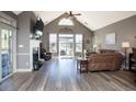 Spacious living room with hardwood floors and fireplace at 1055 University Forest Dr., Conway, SC 29526