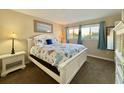 Spacious bedroom with a king-size bed and beach decor at 1906 S Ocean Blvd. # 108A, Myrtle Beach, SC 29577