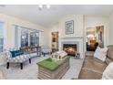 Cozy living room with fireplace and plenty of natural light at 3737 Kingsley Dr., Myrtle Beach, SC 29588