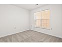 Bright bedroom with neutral walls and carpet at 4243 Villa Dr. # 502, Little River, SC 29566