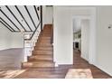 Wooden staircase leading to the upper level of the home at 47 Byers Trail, Pawleys Island, SC 29585