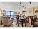 Spacious living area with ocean views, comfortable seating, and dining area at 5308 N Ocean Blvd. # 701, Myrtle Beach, SC 29577