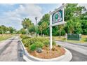 Community entrance sign for River Oaks Golf Plantation at 557 White River Dr. # 12A, Myrtle Beach, SC 29579