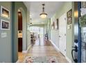 Bright entry hall with hardwood floors and views to living room at 569 Miromar Way, Myrtle Beach, SC 29588