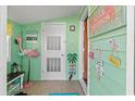 Beach-themed entryway with flamingo decor and welcome signs at 703 3Rd Ave. S, North Myrtle Beach, SC 29582