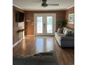 Living room with hardwood floors and access to balcony at 130 Easy St., Murrells Inlet, SC 29576