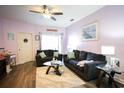 Living room with two sofas, coffee table, and light purple walls at 149 Westhaven Dr. # B13, Myrtle Beach, SC 29579