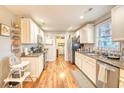 Modern kitchen with granite countertops and stainless steel appliances at 1900 Allston St., Georgetown, SC 29440