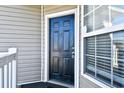 Exterior view of a black front door with window at 213 Wando River Rd. # 11-G, Myrtle Beach, SC 29579