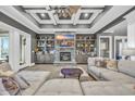 Spacious living room featuring a stone fireplace and built-in shelving at 2560 Ellerbe Circle, Myrtle Beach, SC 29588