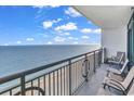 Private balcony offering breathtaking ocean views and comfortable seating at 3000 Ocean Blvd. N # 1905, Myrtle Beach, SC 29577