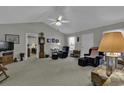 Living room with vaulted ceiling, neutral decor, and comfortable furniture at 3035 Dewberry Dr., Conway, SC 29527