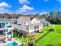 Luxury home with pool and screened porch, located in a beautiful community at 304 Spartina Ct., North Myrtle Beach, SC 29582