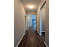 Light-filled hallway with hardwood floors leading to the main living areas at 4085 Alvina Way, Myrtle Beach, SC 29579