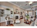 Spacious living room with a fireplace and built-in shelving at 58 Long Creek Dr., Murrells Inlet, SC 29576