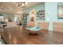 Dining area with a large wood table and wicker chairs at 5808 Bridlewood Rd., North Myrtle Beach, SC 29582