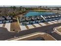 Aerial perspective of townhouses near a pond, highlighting one specific unit at 592 Sea Sparrow St., Myrtle Beach, SC 29588