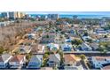 Aerial view of a coastal home in a neighborhood close to the beach and surrounding area at 820 9Th Ave. S, North Myrtle Beach, SC 29582