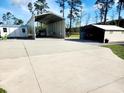 The property features a detached garage, carport, and storage shed at 926 Eula Dr., Conway, SC 29526