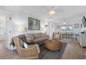 Bright living room with comfy seating and coastal decor at 147 Anglers Dr., Murrells Inlet, SC 29576